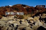 Ferienhaus mit Meeresblick am Hang