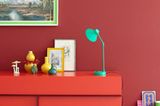 Sideboard und Wandfarbe in Rot