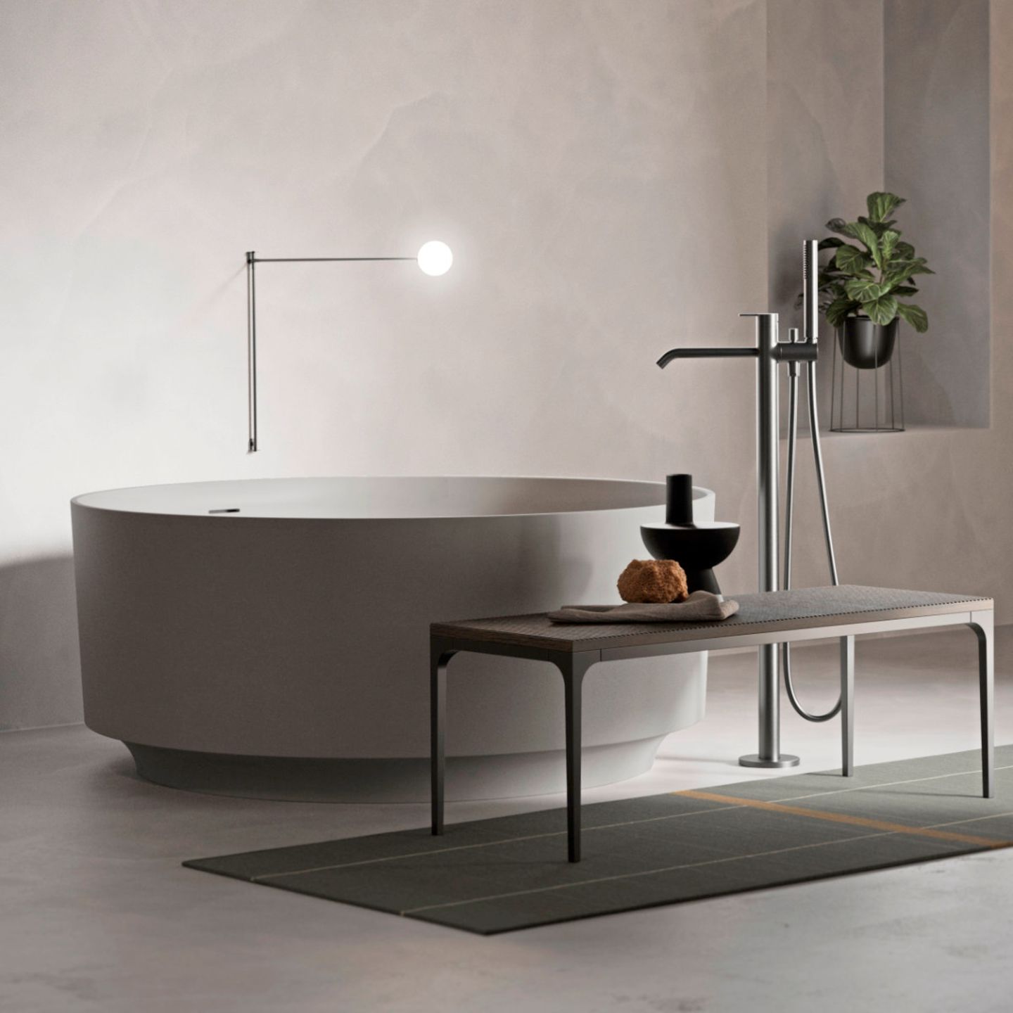 Luxuriöses Badezimmer mit kreisrunder, frei stehender Badewanne – entworfen von Norm Architects