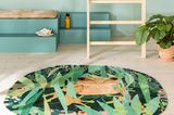 Runder Teppich mit Froschmotiv in Kinderzimmer